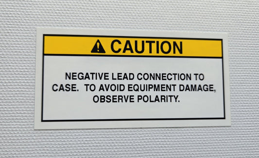Negative Lead Connected to Case Caution Label (2) (our #127)