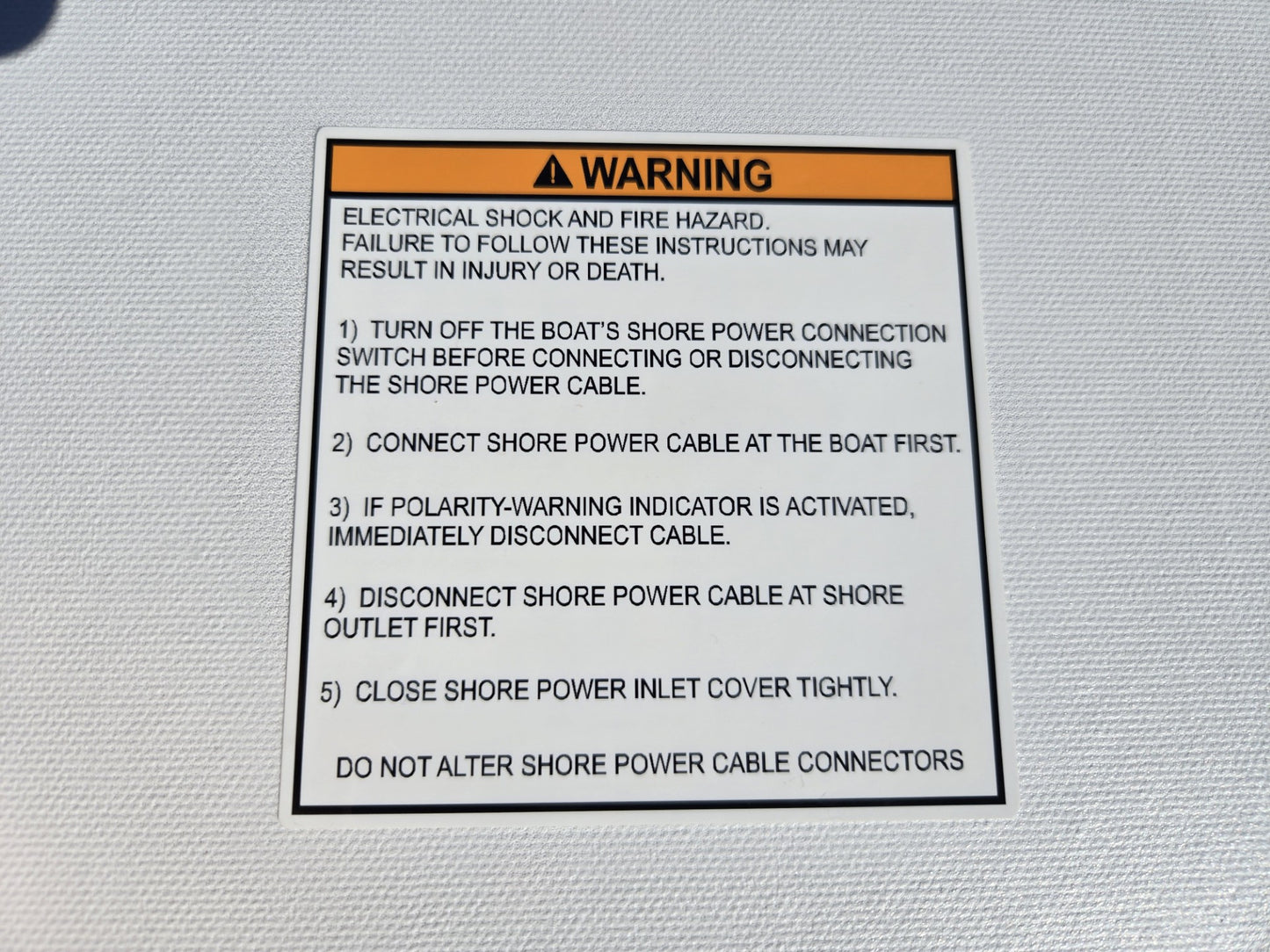 AC Shore Power Inlet Warning Label (our #141)